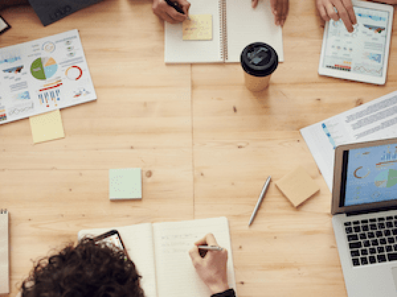 Why Risk Management image of People working in office